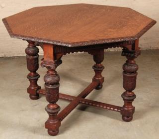 Appraisal: CARVED OAK RENAISSANCE REVIVAL STYLE OCTAGON FORMED CENTER TABLE WITH