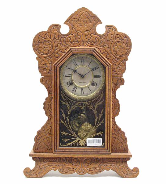 Appraisal: An American carved walnut mantel clock height of tallest in