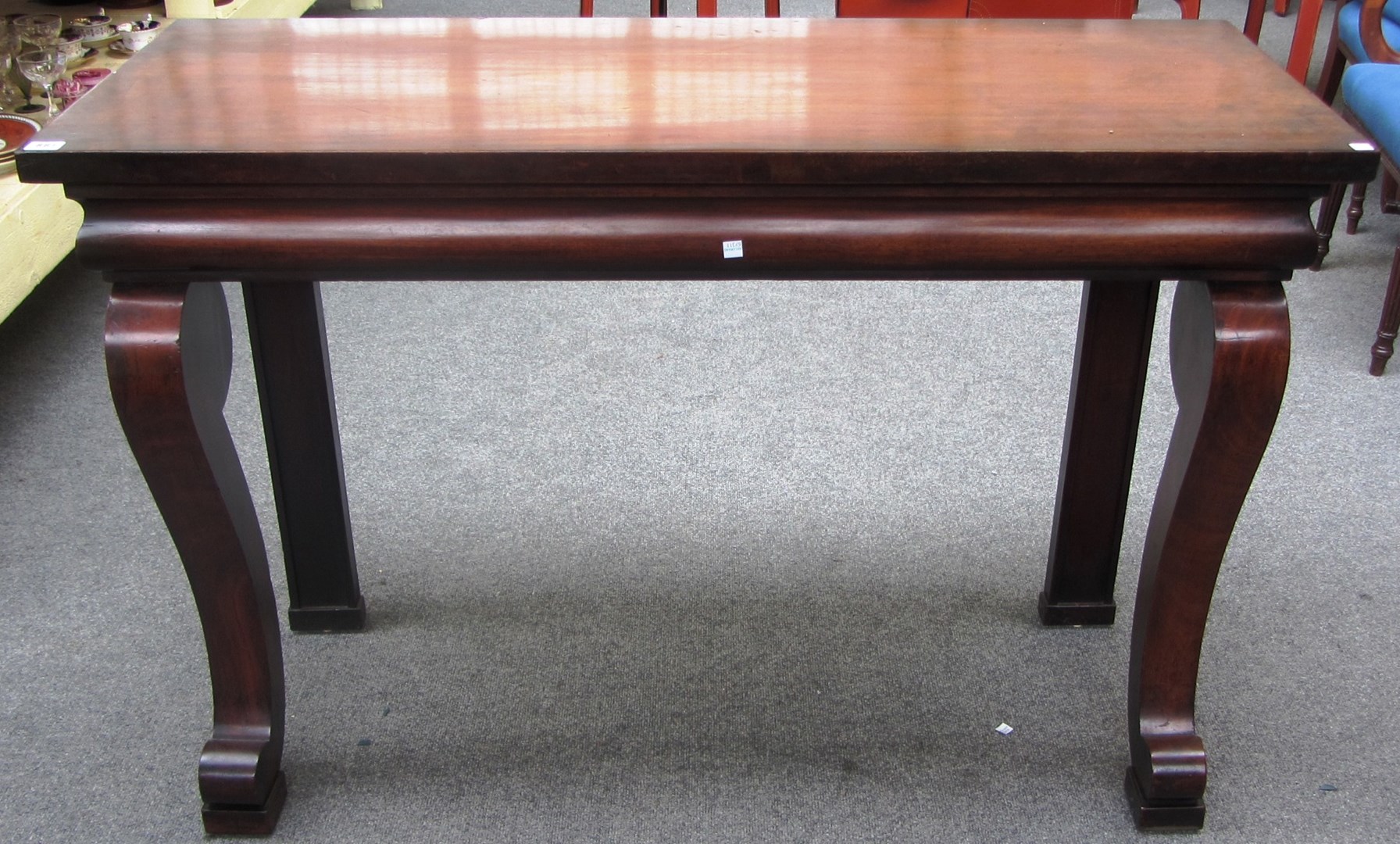 Appraisal: A th century mahogany console table the rectangular top on