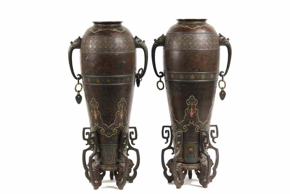 Appraisal: PAIR JAPANESE MIXED METAL URNS ON STANDS - Pair of