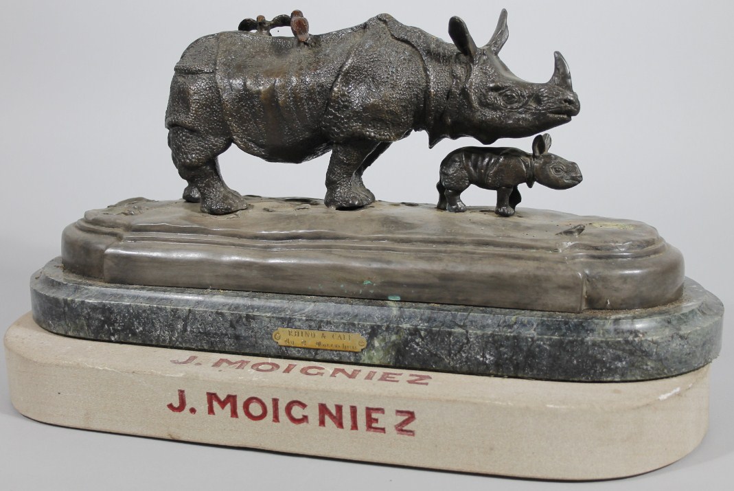 Appraisal: A thC hollow bronze figure group of two rhinoceroses entitled