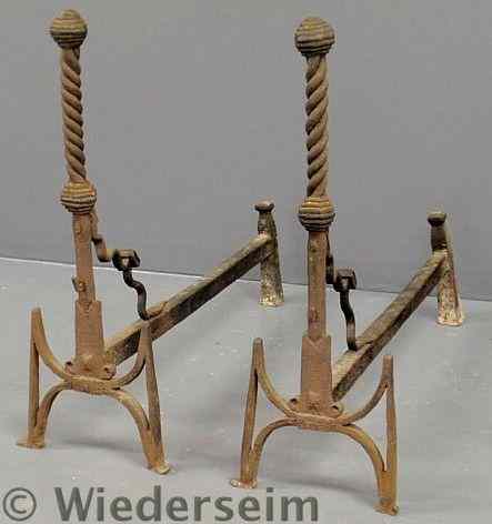 Appraisal: Large pair of wrought iron andirons late th c h