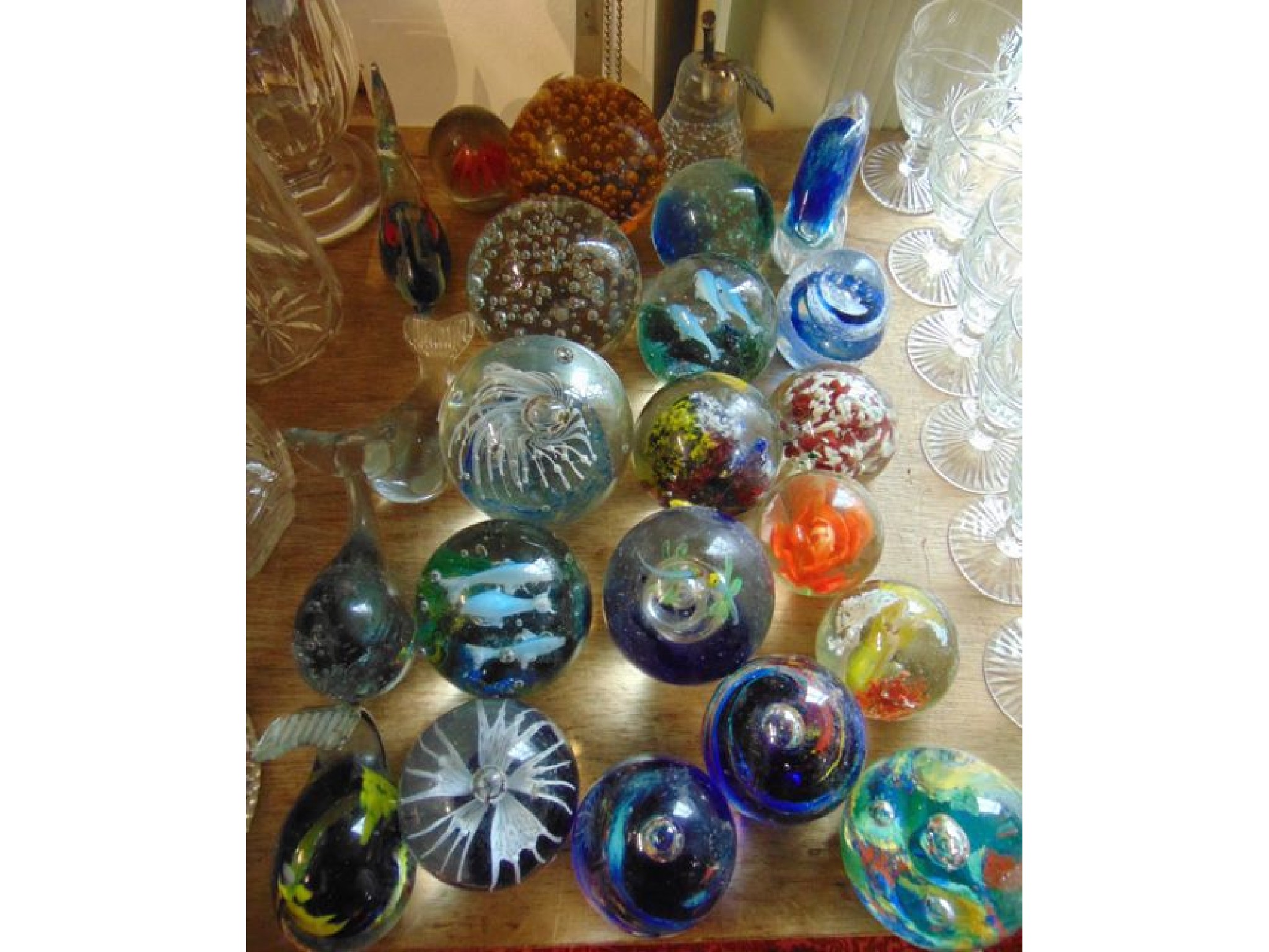 Appraisal: An assortment of decorative glass paperweights to include an example