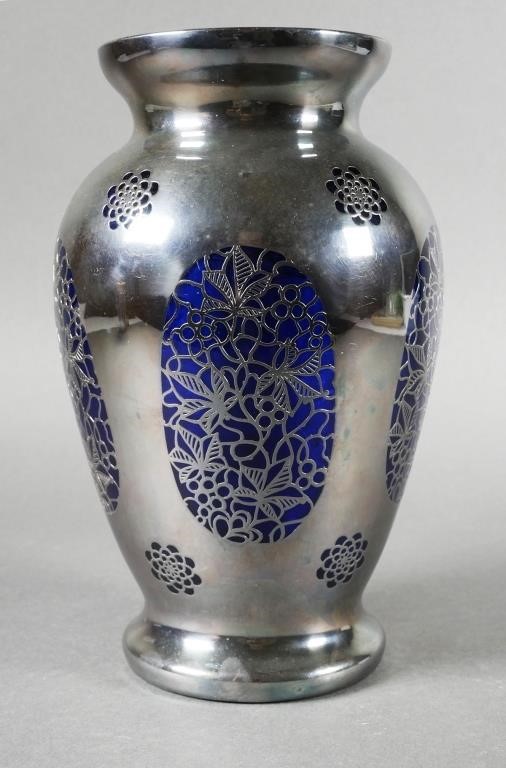 Appraisal: European glass vase with reticulated sterling silver overlay Measures about