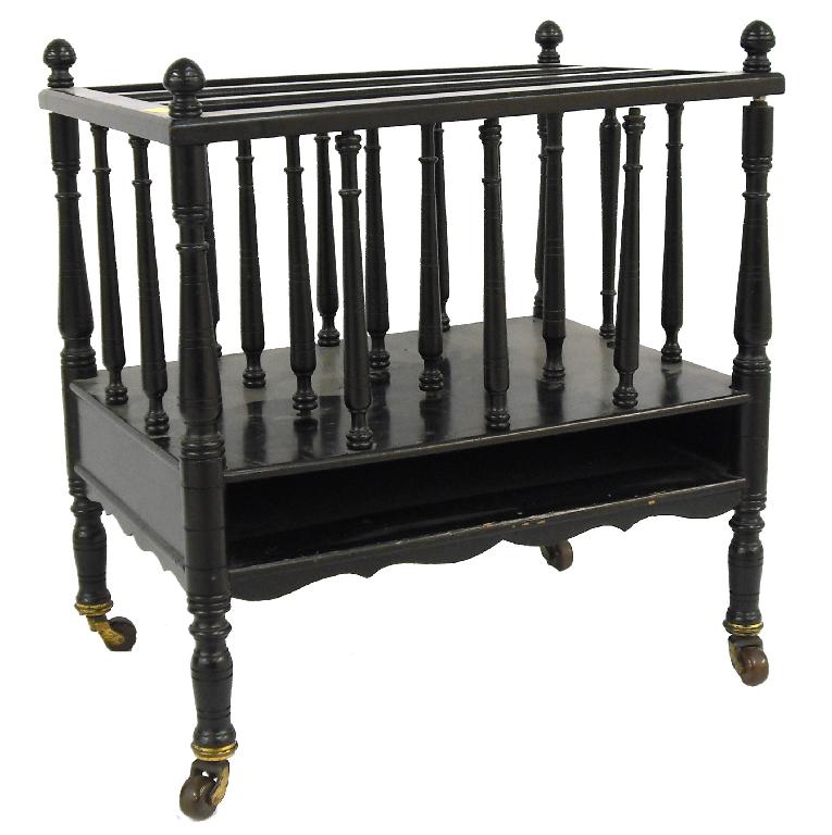 Appraisal: Aesthetic Movement ebonised three division Canterbury with ring turned supports