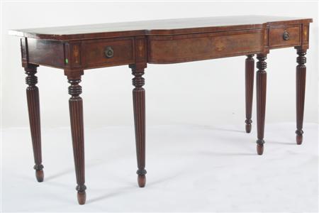 Appraisal: A Regency mahogany and crossbanded serving table the top of