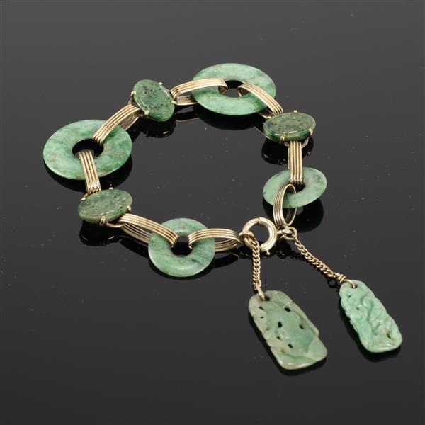 Appraisal: Yellow K Gold Link Bracelet with Chinese carved jade medallions