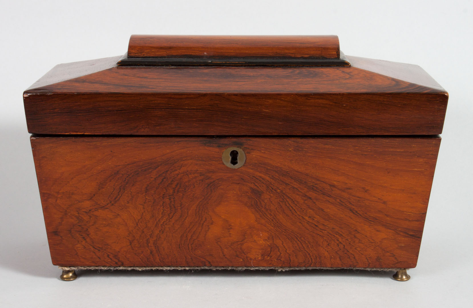 Appraisal: Regency rosewood tea caddy circa sarcophagus-form with fitted interior in