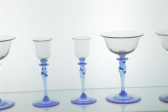 Appraisal: SIX PIECES OF STEUBEN STEMWARE Smokey clear vessels on twisted