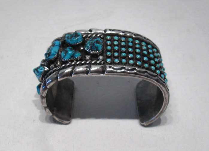 Appraisal: OLD PAWN SILVER AND TURQUOISE BRACELET having seven turquoise nuggets