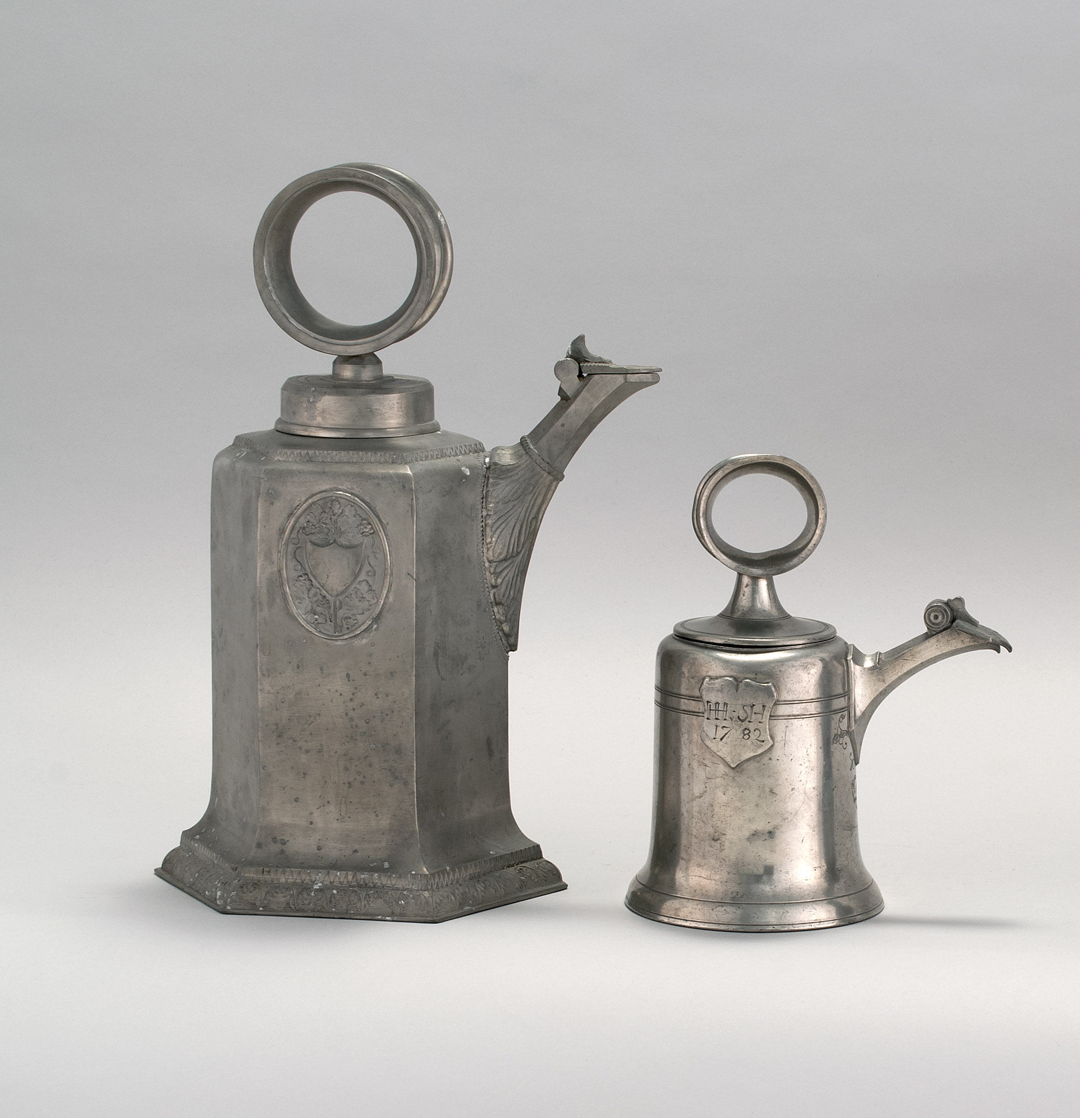 Appraisal: TWO SWISS PEWTER WINE WATER FLAGONS th th CenturyOne in