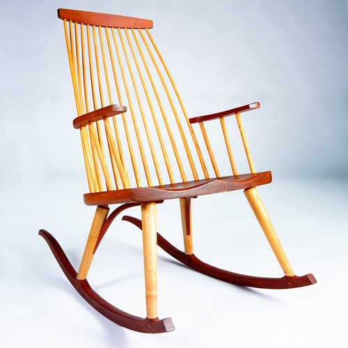 Appraisal: THOS MOSER CABINETMAKERS Windsor-influenced armrocker with saddle seat and spindles