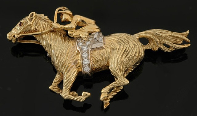 Appraisal: A diamond set brooch Modelled as a race horse and