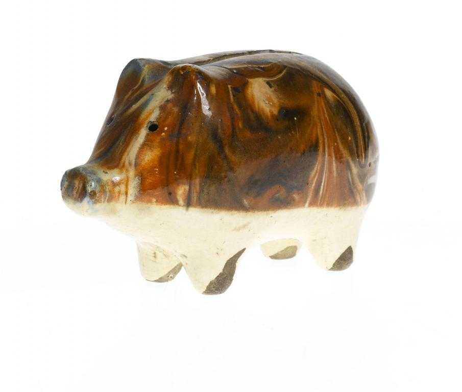 Appraisal: A SLIPWARE BANK IN THE FORM OF A PIG the