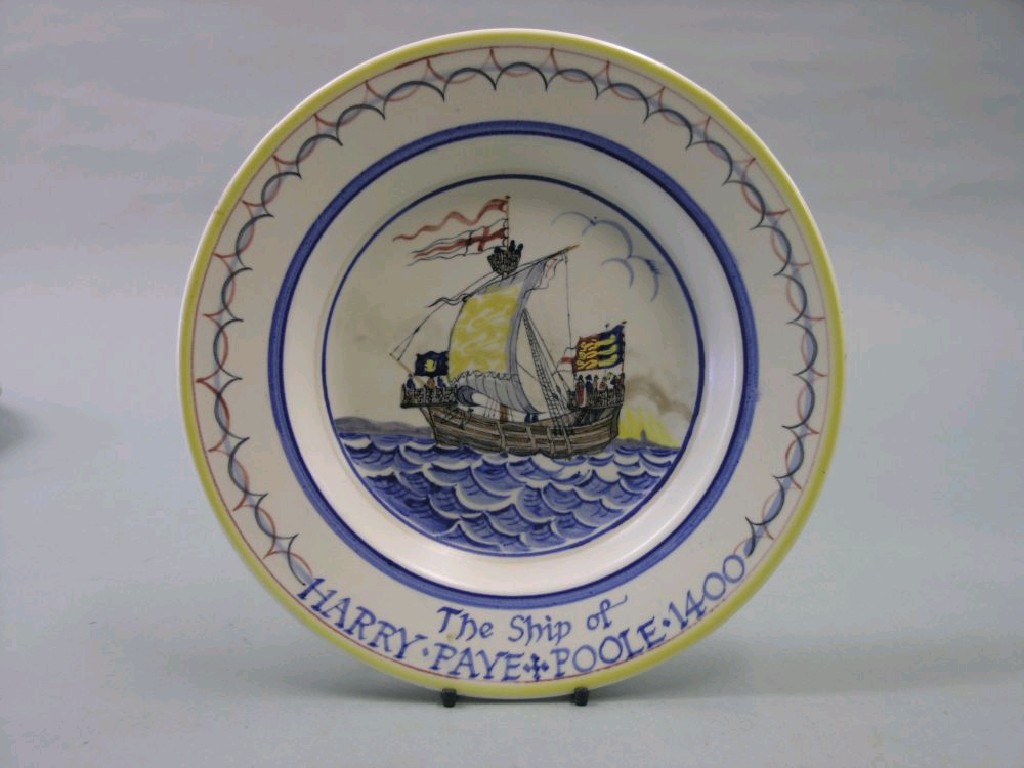 Appraisal: A Poole Pottery commemorative wall plate inscribed The Ship of