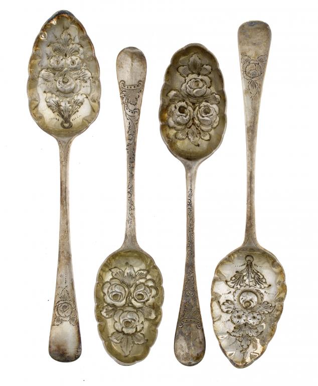 Appraisal: TWO PAIRS OF VICTORIAN-EMBOSSED AND PARCEL GILT FRUIT SERVING SPOONS