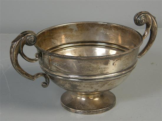 Appraisal: George V silver trophy cup with scrolling stylised foliate handles