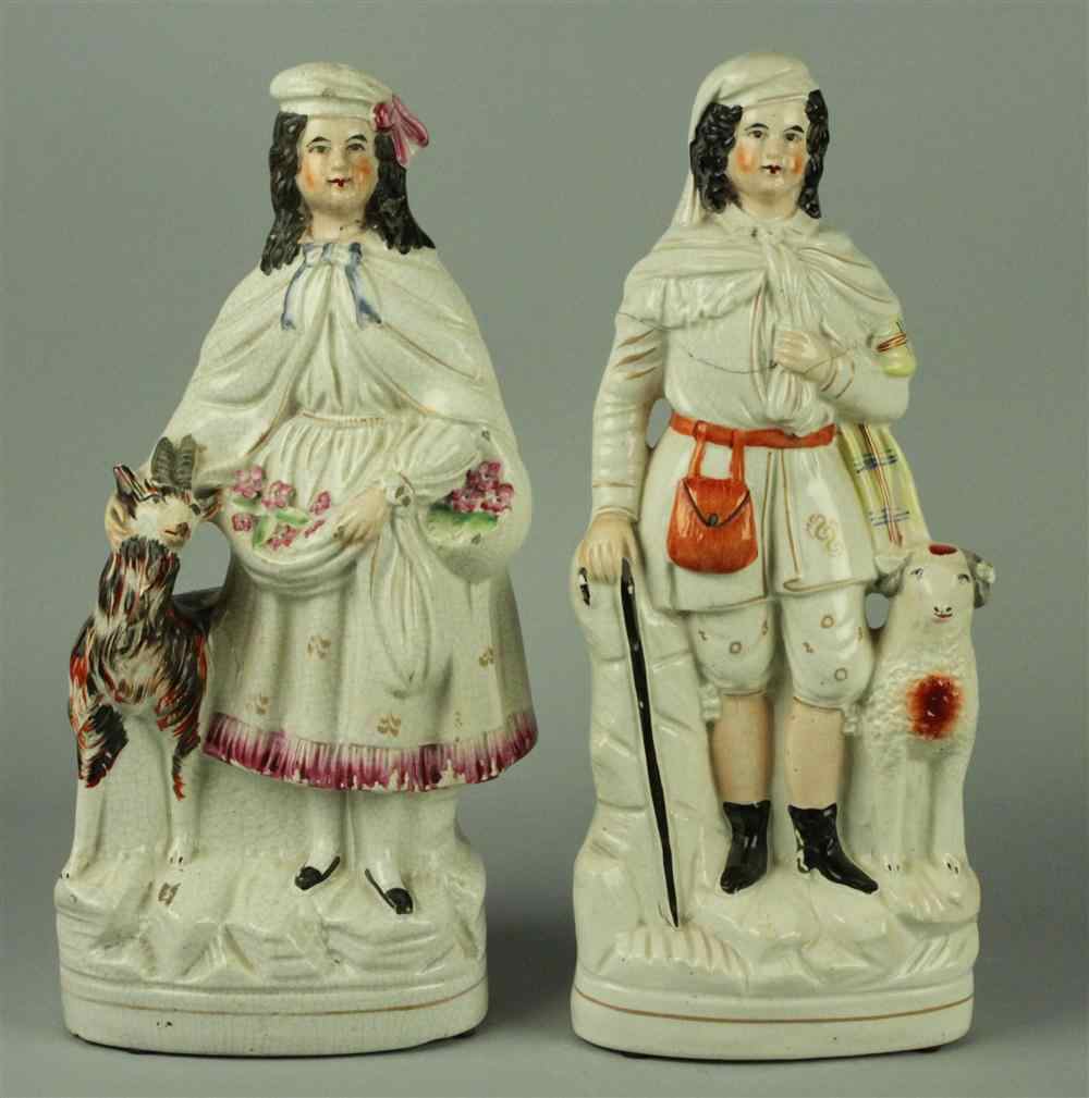 Appraisal: TWO STAFFORDSHIRE FIGURES one a girl with flowers in her