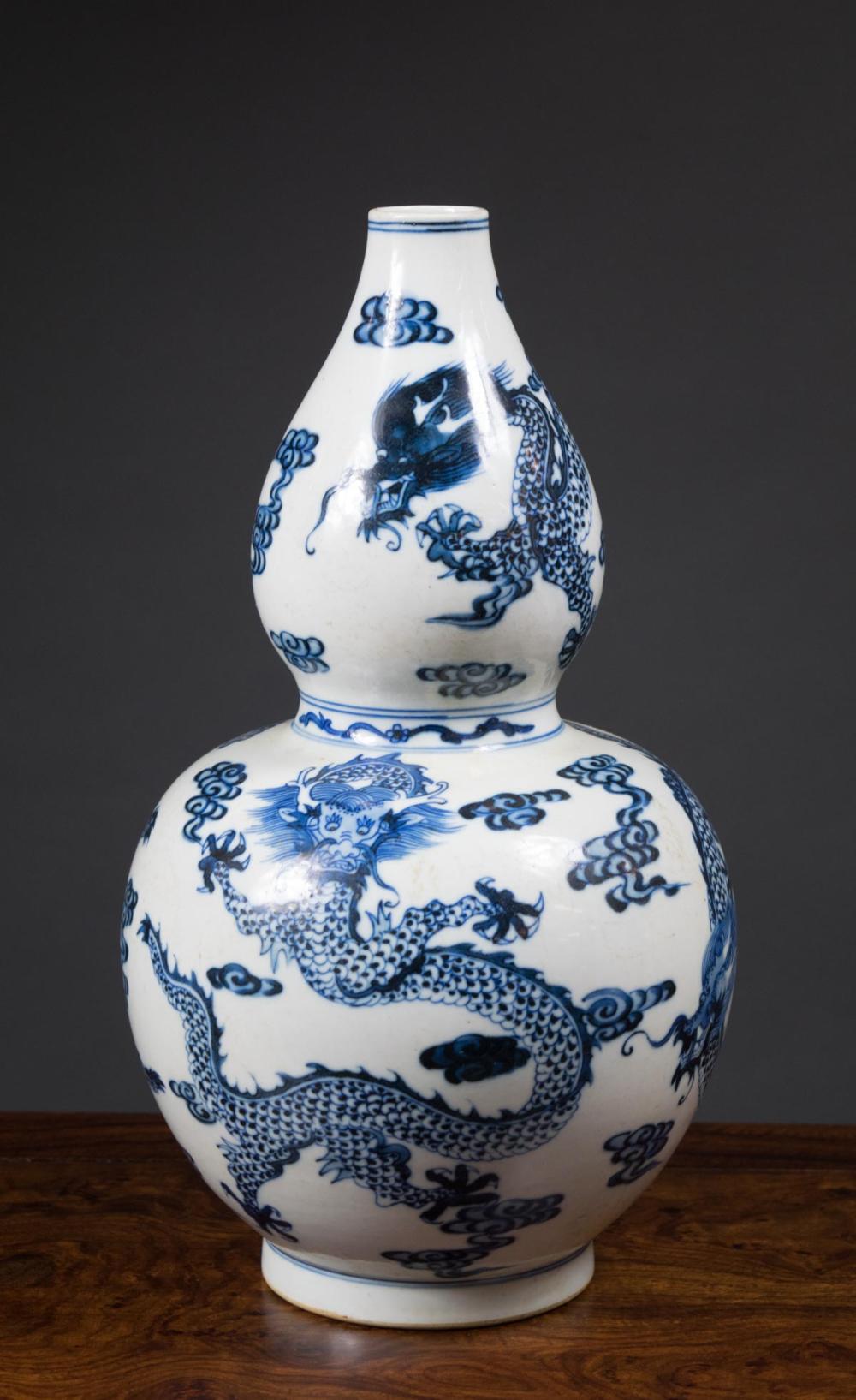 Appraisal: CHINESE BLUE AND WHITE PORCELAIN VASE of double gourd form