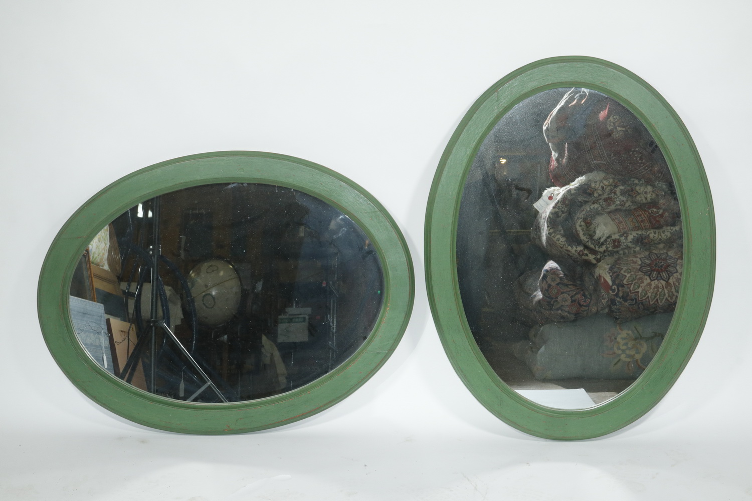 Appraisal: MATCHING GREEN PAINTED OVAL WOODEN MIRRORS Oval wooden framed matching