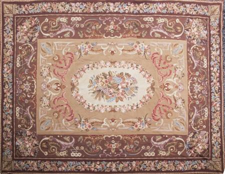 Appraisal: An Aubusson style needlepoint carpet modern the light brown field