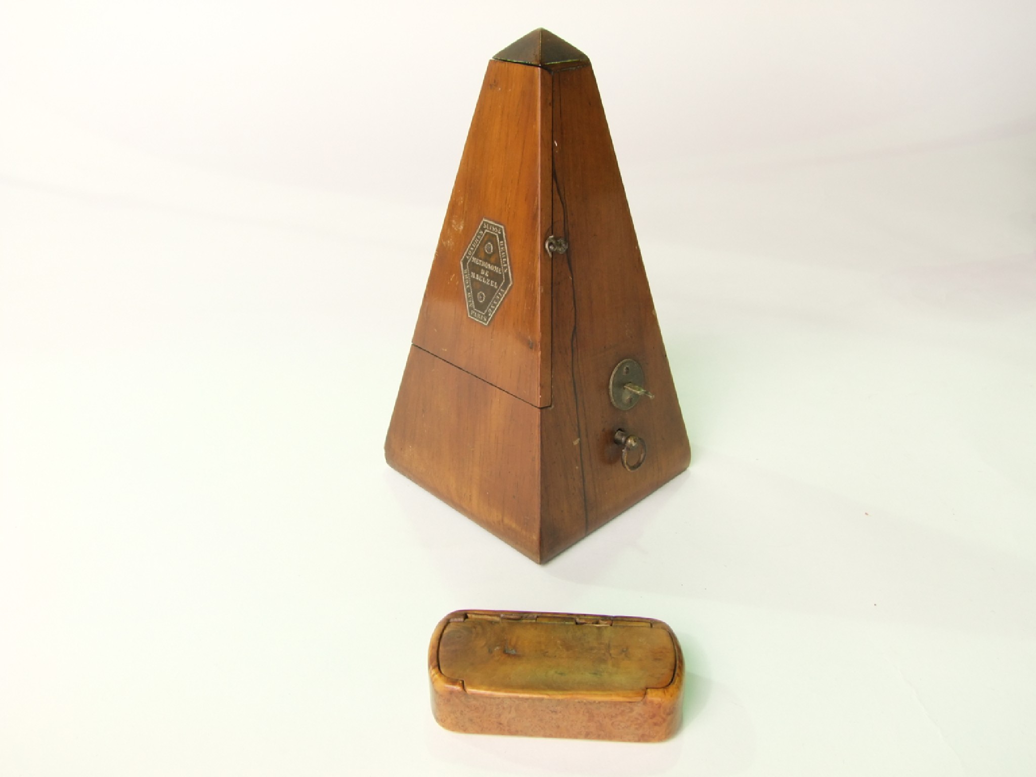 Appraisal: A French rosewood veneered metronome marked Metronome De Naelzel Paris