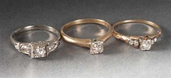 Appraisal: Three K gold and diamond rings the rings including precious