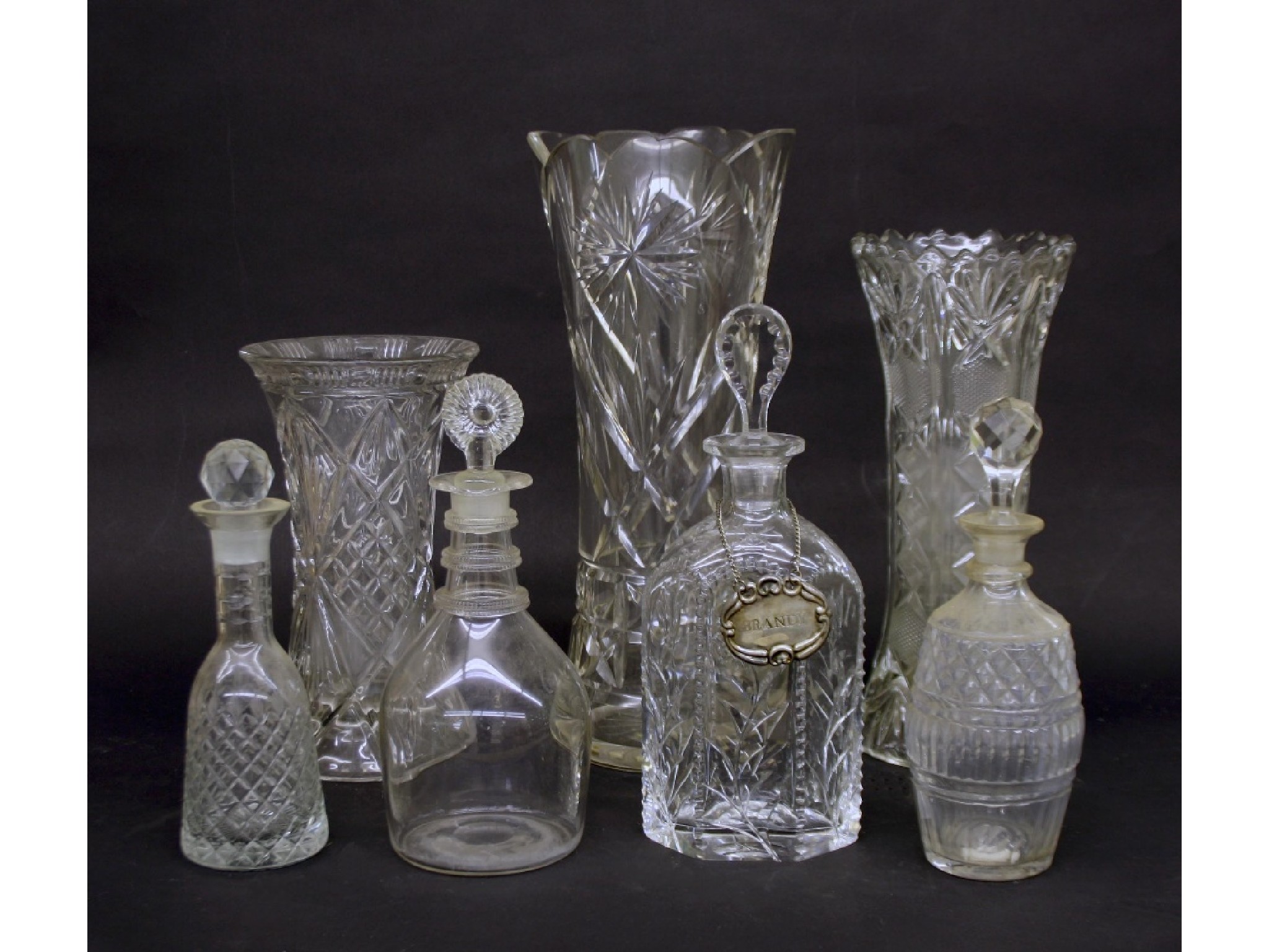 Appraisal: Mixed collection of cut glass to include three decanters with