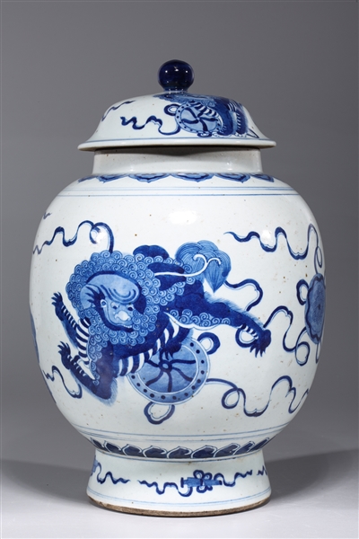 Appraisal: Chinese blue and white covered porcelain jar with lions and