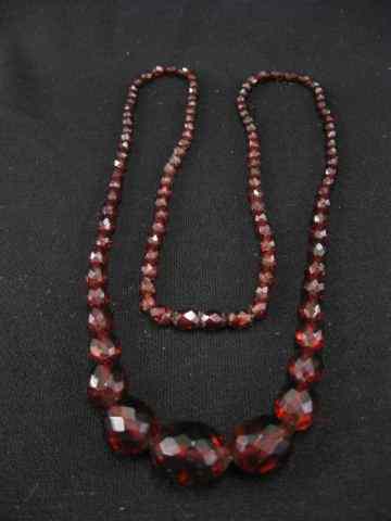 Appraisal: Cherry Amber Necklace graduatedbeads rich color faceted circa '' long