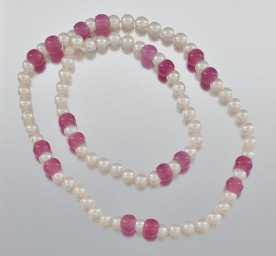 Appraisal: A Pink Jadeite Bead and Pearl Necklace The necklace is