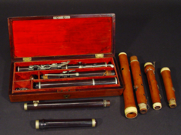 Appraisal: Three piece rosewood flute in a velvet lined mahogany case