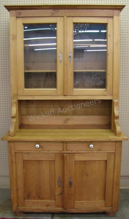 Appraisal: An antique Austrian pine cupboard two drawers with porcelain pulls