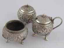 Appraisal: An Indian white metal tests silver condiment set wt oz