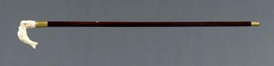 Appraisal: Rosewood and ivory walking stick finely carved ivory handle shaped