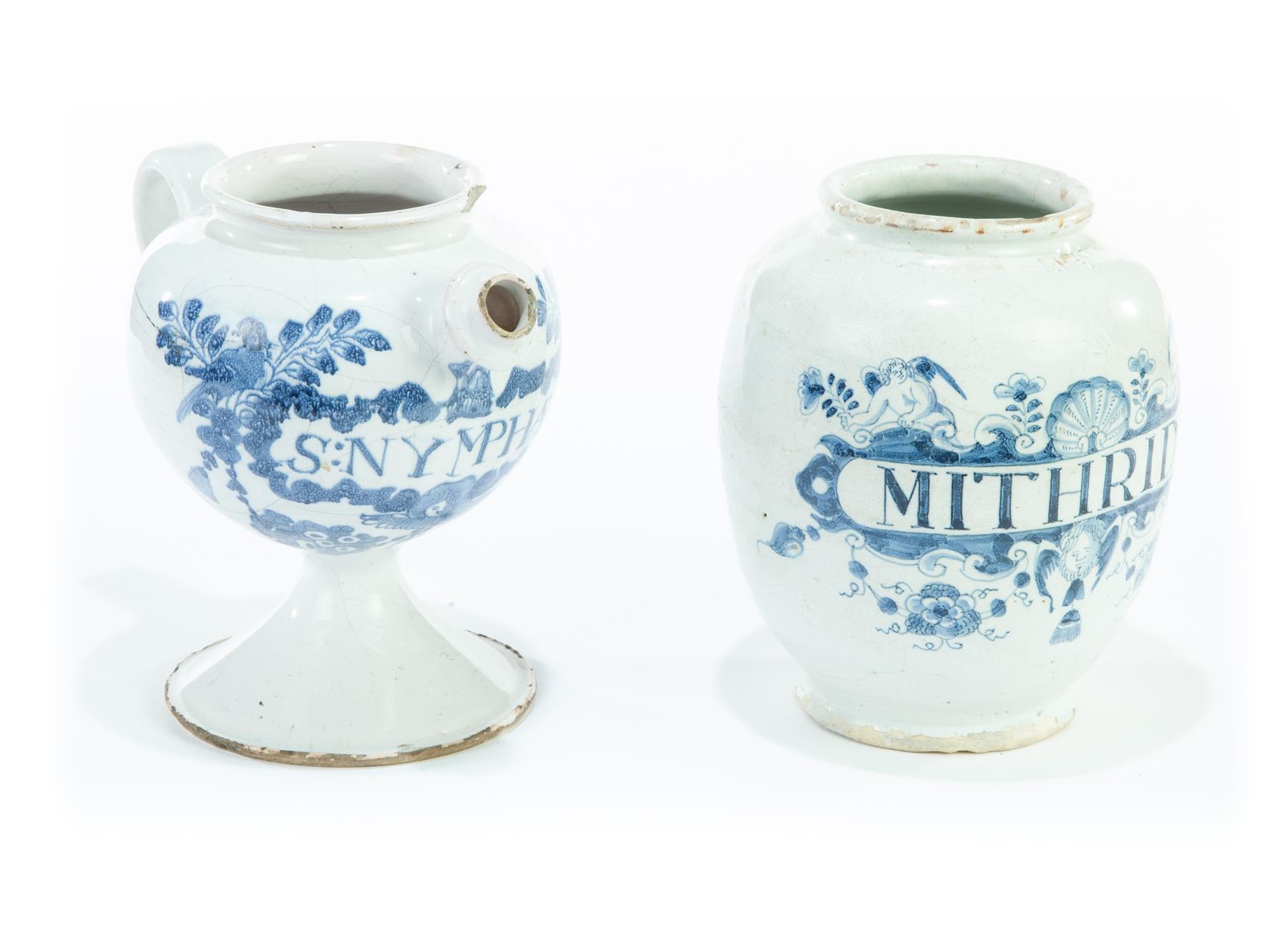 Appraisal: TWO DELFT APOTHECARY JARS Eighteenth century Mithrid label with cherubs