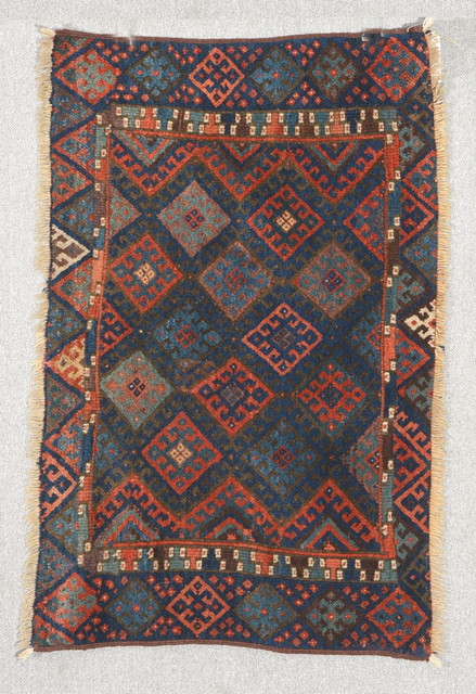 Appraisal: A KURDISH JAF BAG FACE with diamond decoration on a