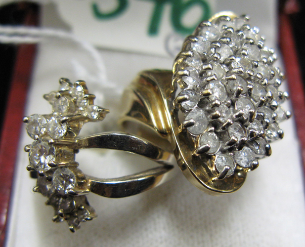 Appraisal: TWO DIAMOND AND TEN KARAT GOLD CLUSTER RINGS one white