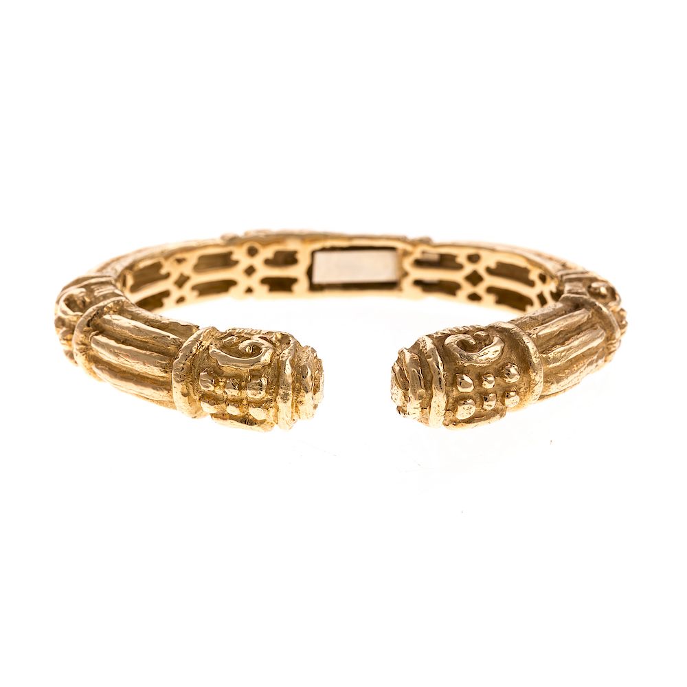 Appraisal: A Ladies Engraved Bangle by Katy Briscoe in K K