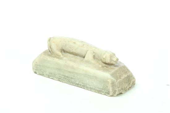 Appraisal: DOORSTOP Pennsylvania th century marble Naive carved dog reclining on