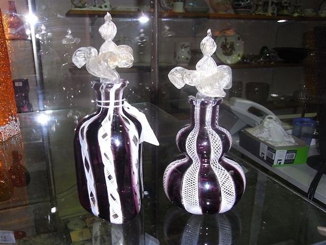 Appraisal: A PAIR OF VENETIAN AMETHYST GLASS SCENT BOTTLES