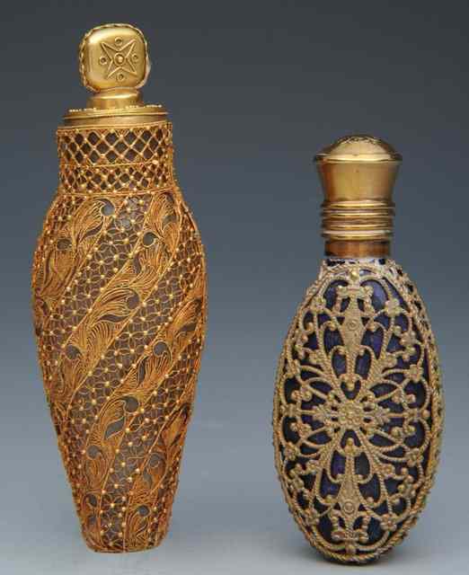 Appraisal: A FRENCH GILT FILIGREE MOUNTED SCENT BOTTLE with gold metal