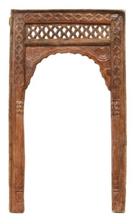 Appraisal: Architectural arched window frame India pierced lattice band floral and