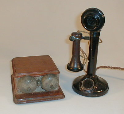 Appraisal: An early thC black candlestick telephone with Bakelite mouthpiece marked