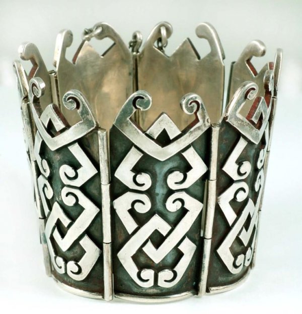 Appraisal: A heavy sterling silver Mexican cuff bracelet consisting of seven