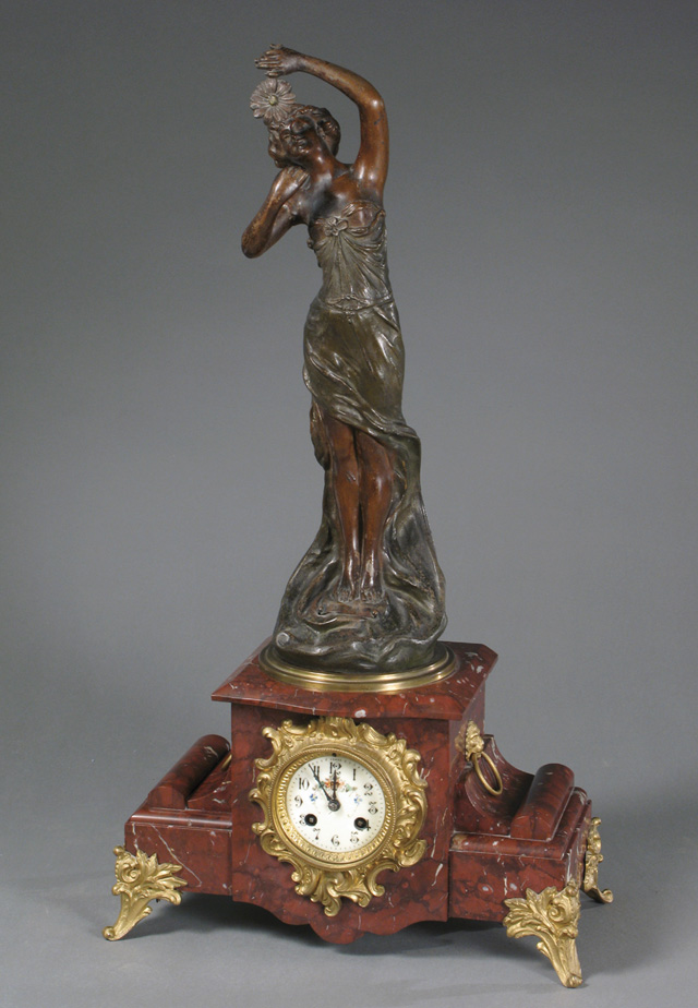 Appraisal: BRONZED SPELTER AND ROUGE MARBLE STATUE CLOCK French c the