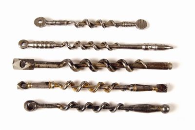 Appraisal: Five peg and worm corkscrews a faceted example with traces