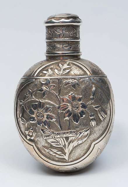 Appraisal: A VICTORIAN SILVER MOUNTED SCENT BOTTLE with marks for Chester