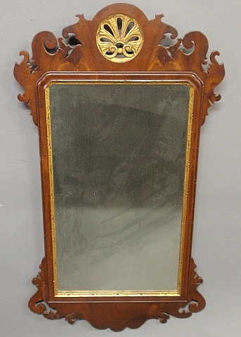 Appraisal: - Chippendale style mirror with a carved mahogany frame with