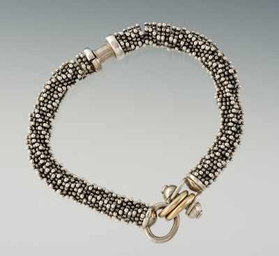 Appraisal: A Michael Dawkins Sterling Silver and Gold Bracelet Sterling silver